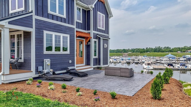 208 Leeward Way, Ottawa, IL 61350 - view of patio / terrace featuring a water view, entry steps, and view of marina