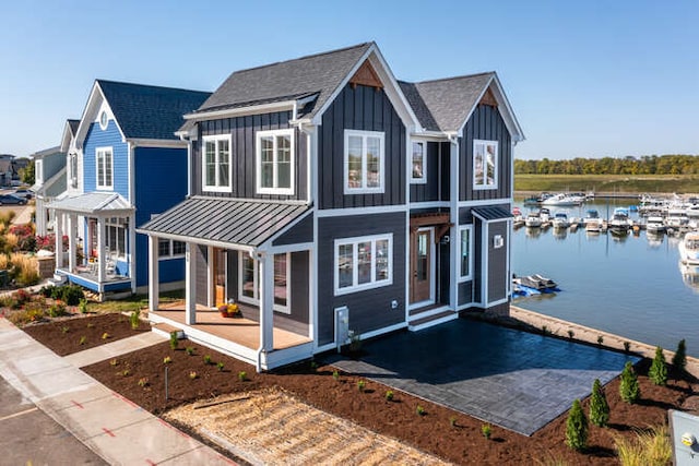 view of front facade featuring a water view