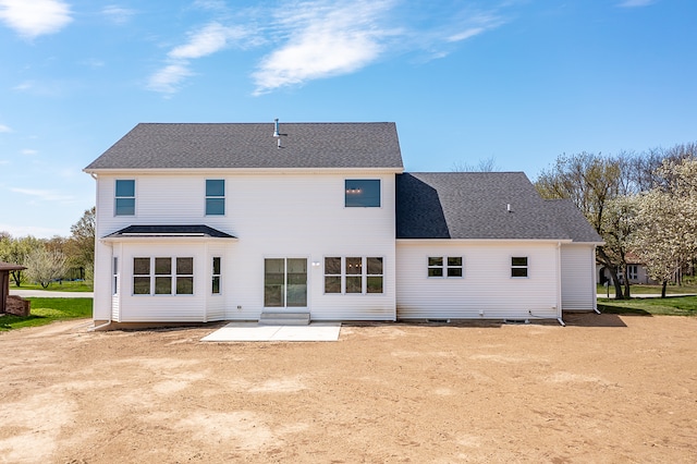 rear view of house featuring a patio