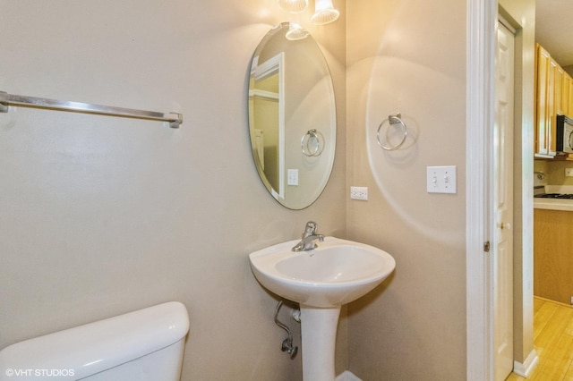 211 Grand Ridge Rd, Saint Charles, IL 60175 - bathroom with toilet and wood finished floors
