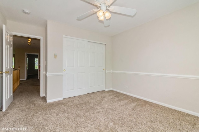 211 Grand Ridge Rd, Saint Charles, IL 60175 - unfurnished bedroom featuring carpet floors, baseboards, a closet, and a ceiling fan