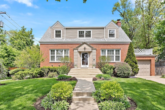 view of front facade featuring a garage and a front yard