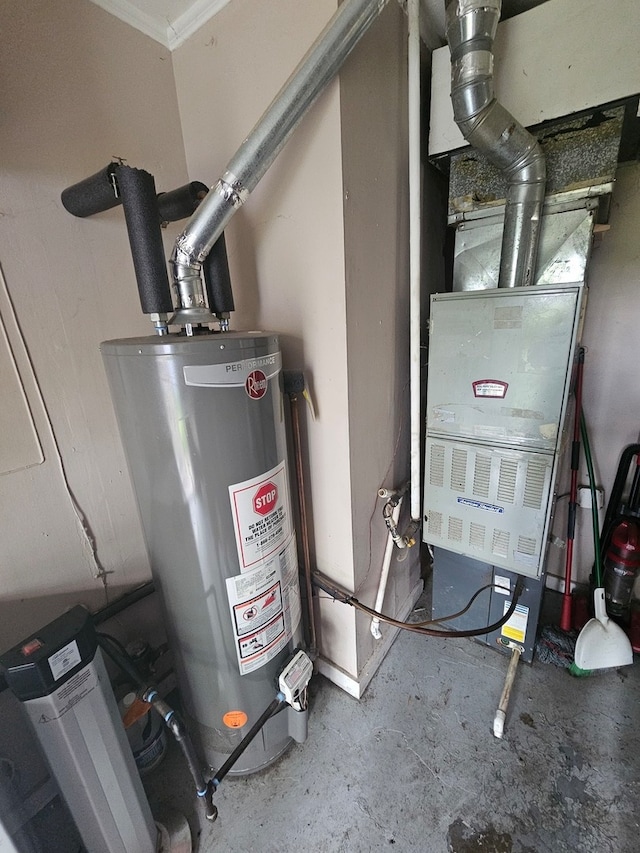 utility room featuring water heater