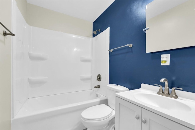 bathroom featuring toilet, shower / tub combination, and vanity