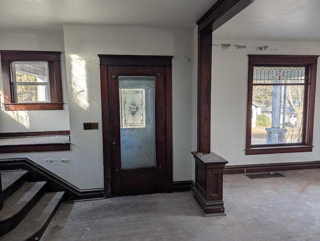 foyer with plenty of natural light