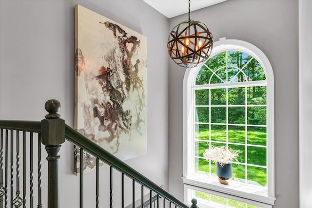 interior details featuring a chandelier