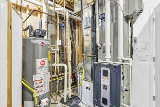 utility room featuring gas water heater