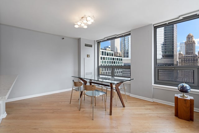 dining area with light wood-type flooring