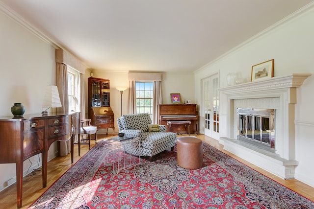 living room featuring light parquet floors and crown molding