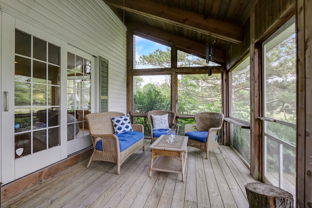 sunroom / solarium with wood ceiling and lofted ceiling with beams