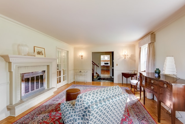 living room with ornamental molding