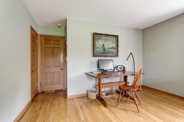 office area with light wood-type flooring