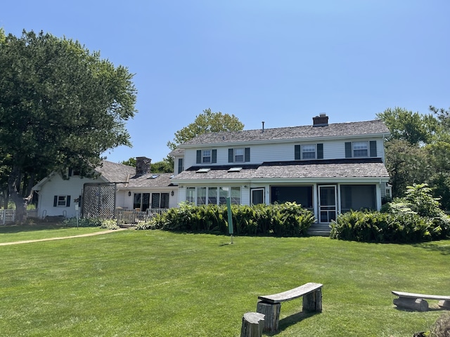 view of front of house with a front lawn