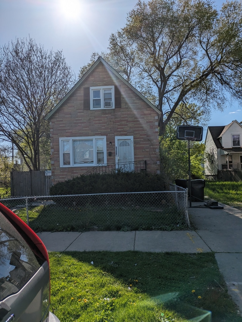 bungalow with a front yard