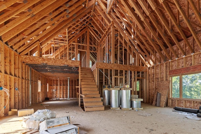 misc room with high vaulted ceiling