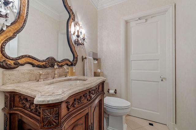 bathroom with tile floors, ornamental molding, large vanity, and toilet