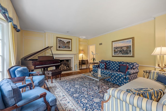 living room featuring wood-type flooring and ornamental molding