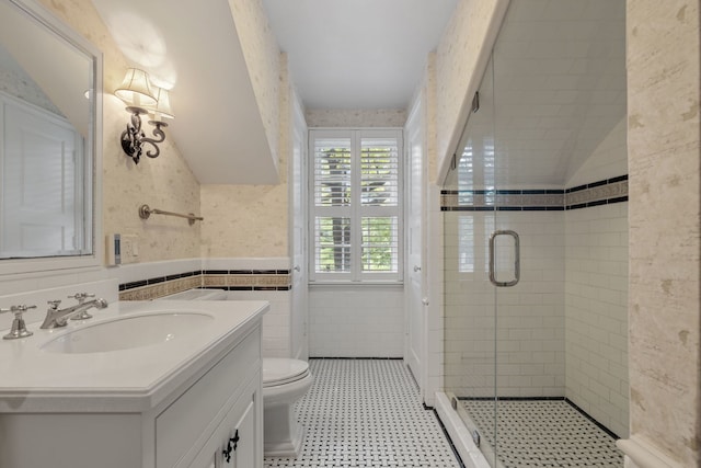 full bath featuring lofted ceiling, wallpapered walls, a shower stall, and tile walls