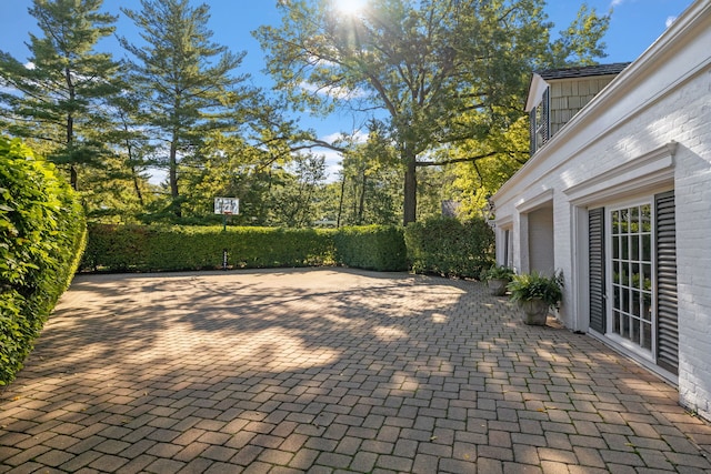 view of patio featuring a garage