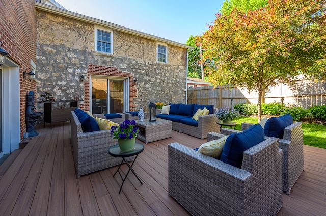 deck featuring outdoor lounge area