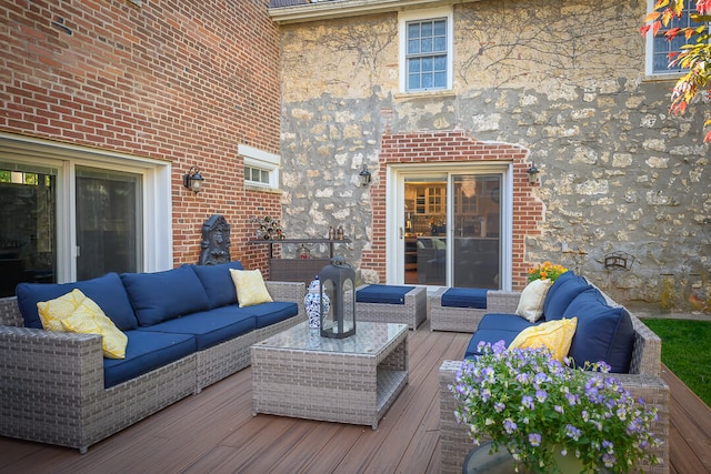 wooden deck with an outdoor hangout area