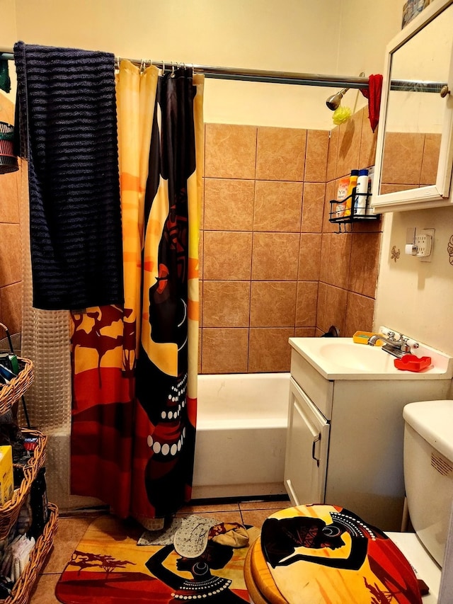 full bathroom with tile patterned flooring, shower / bath combo, vanity, and toilet