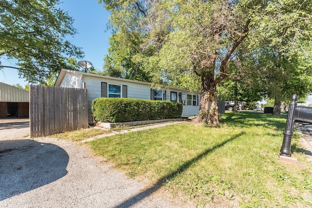 view of front of property with a front lawn