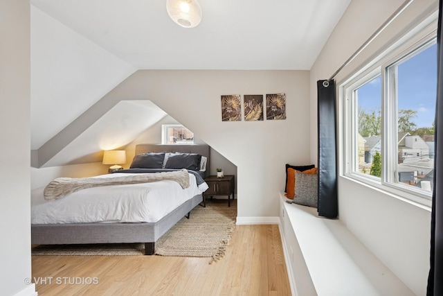 2550 W Thomas St, Chicago, IL 60622 - bedroom featuring lofted ceiling and wood finished floors