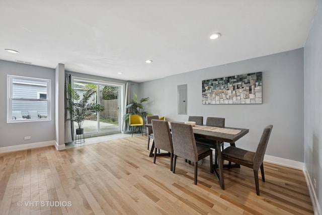 2550 W Thomas St, Chicago, IL 60622 - dining room featuring baseboards, electric panel, recessed lighting, and light wood-style flooring