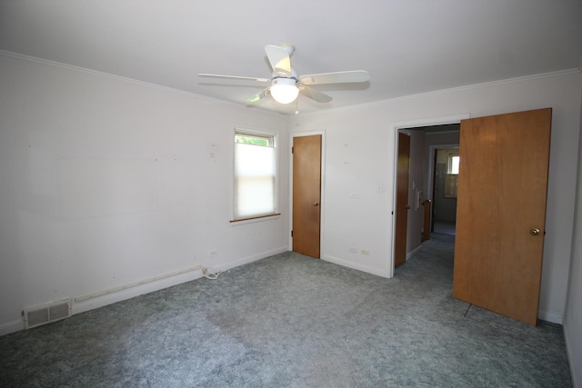 3415 W Maple St, Evergreen Park, IL 60805 - unfurnished bedroom featuring crown molding, carpet flooring, and ceiling fan