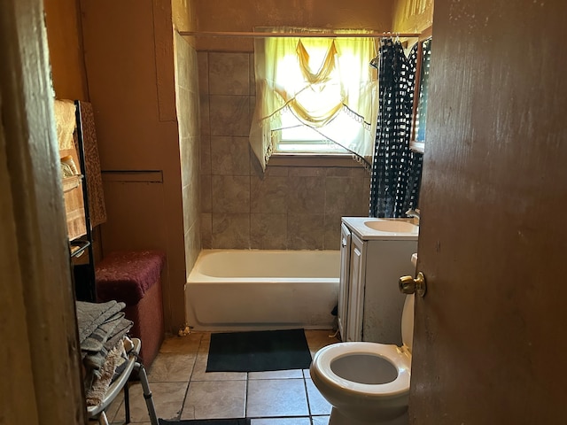 full bathroom featuring bathtub / shower combination, vanity, toilet, and tile floors