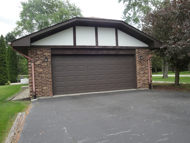 garage with a yard