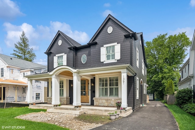 view of front of home featuring covered porch