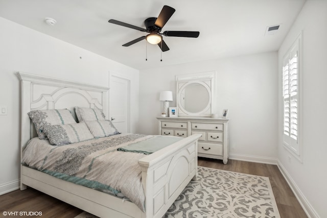 bedroom featuring wood-type flooring and ceiling fan