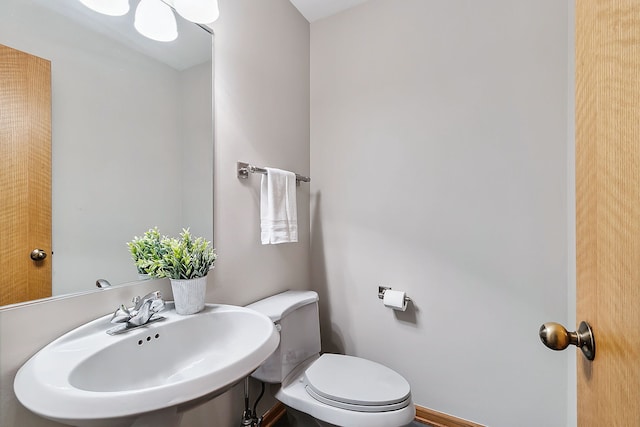 bathroom featuring a sink and toilet