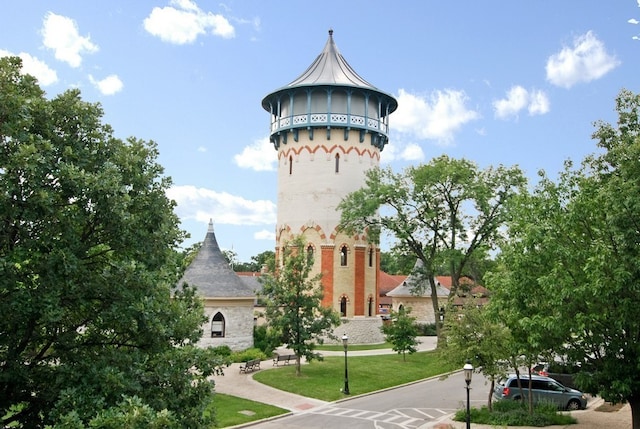 surrounding community with a lawn