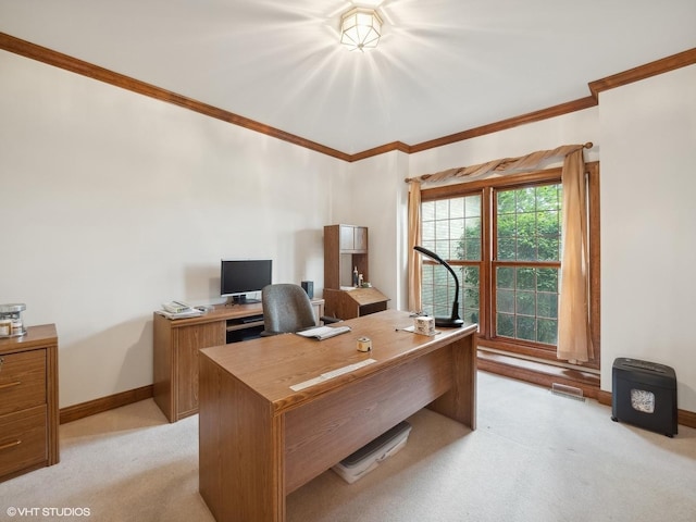 carpeted home office featuring ornamental molding