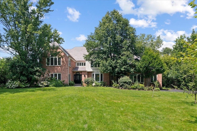 view of front facade with a front yard