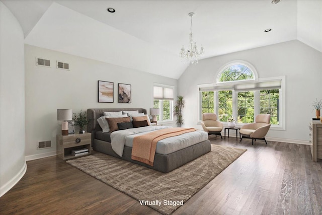 bedroom with a notable chandelier, dark wood-type flooring, and high vaulted ceiling