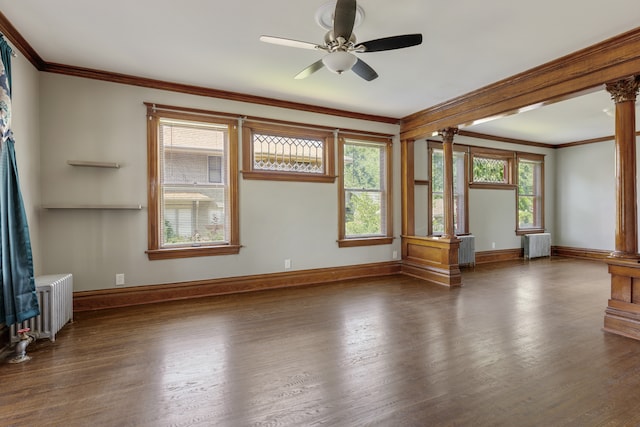 interior space with radiator, dark hardwood / wood-style flooring, ornamental molding, and ceiling fan