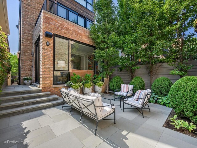 view of terrace featuring an outdoor living space