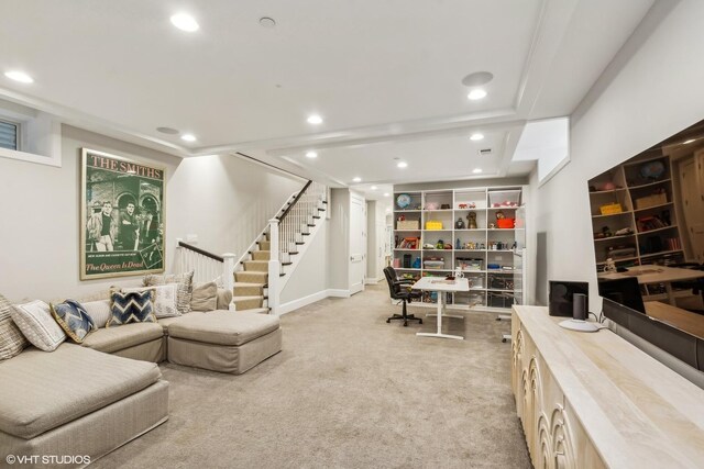 living room featuring light carpet