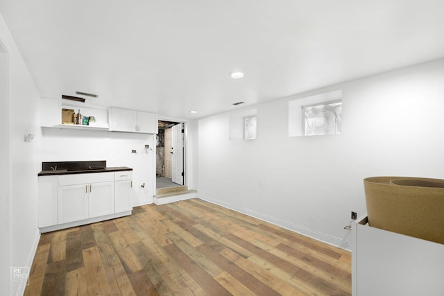 unfurnished living room with light wood-type flooring