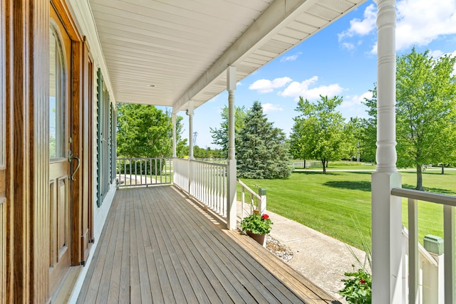 deck featuring a lawn