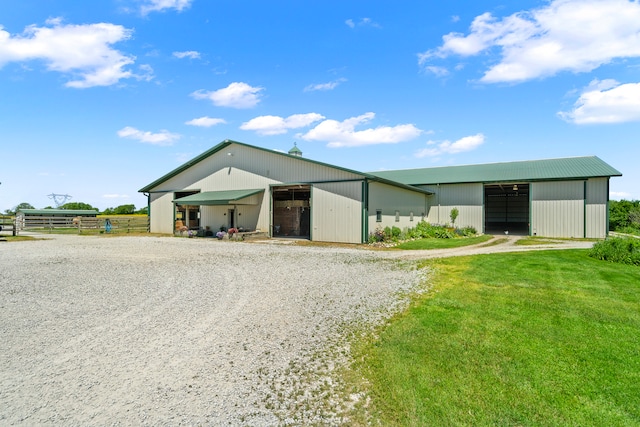 view of shed / structure with a lawn