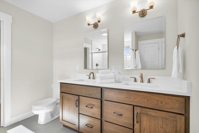 bathroom with tile patterned flooring, vanity, toilet, and a shower with shower door