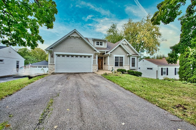 craftsman-style home featuring a front yard