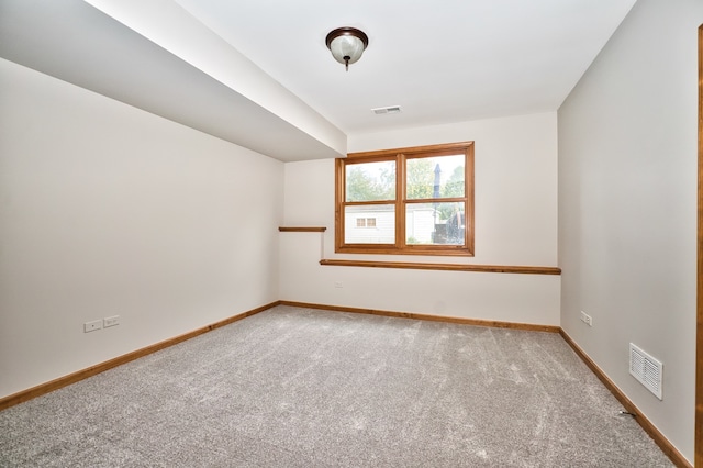 view of carpeted spare room