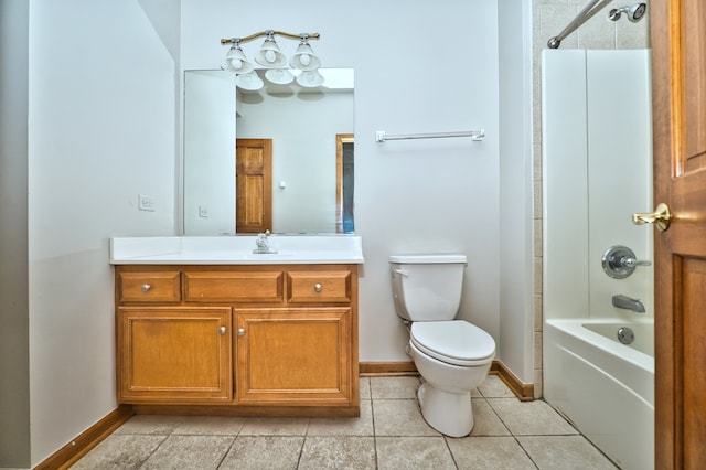 full bathroom with vanity, tiled shower / bath combo, toilet, and tile patterned floors