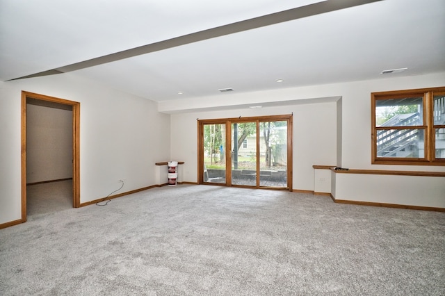 unfurnished living room with carpet